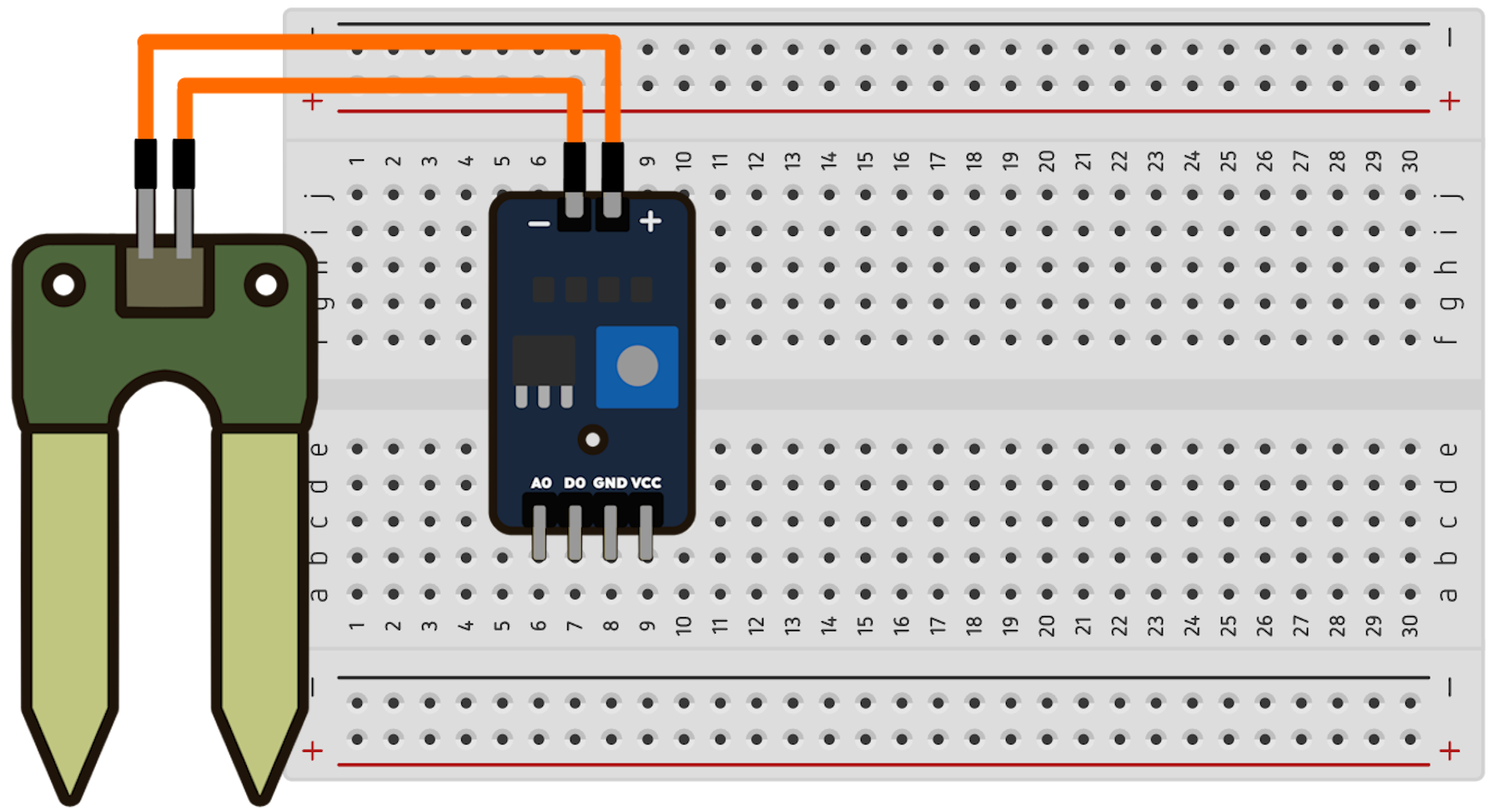 Módulo comparador do sensor de umidade encaixado na protoboard.